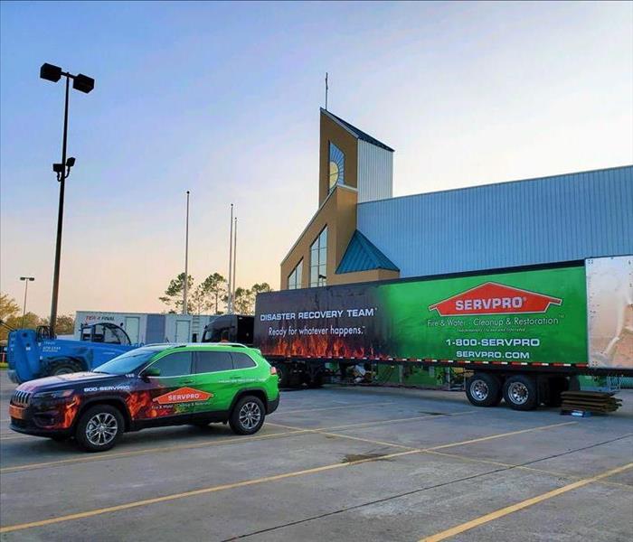 SERVPRO jeep and semi outside of church