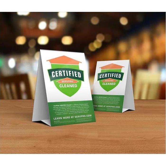 Two table top folding advertisements promoting SERVPRO's Certified: SERVPRO Cleaned Program.