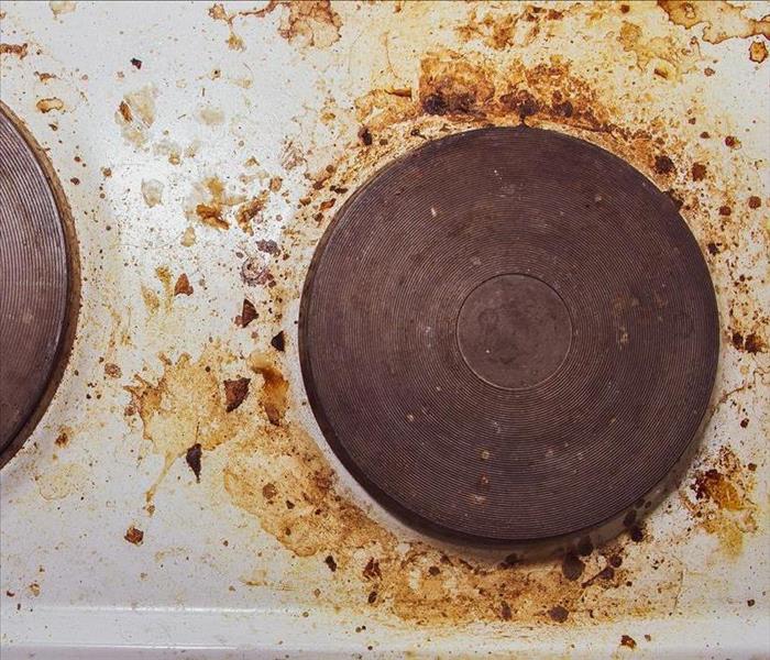 Grease stained stove top.